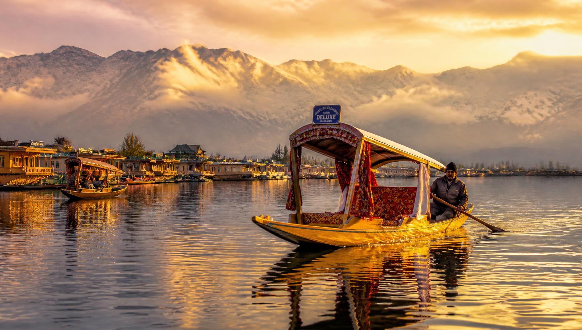 Shikara boats on Dal Lake in Srinagar at golden hour